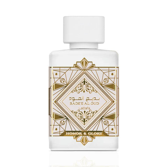 Bouteille de parfum oriental blanche à décor doré, capuchon blanc
