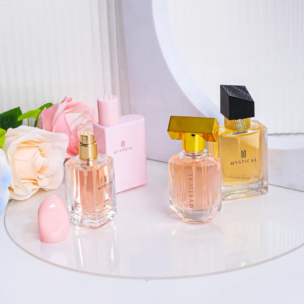 Coffret Découverte : flacons parfum rose et ambre, capuchons dorés