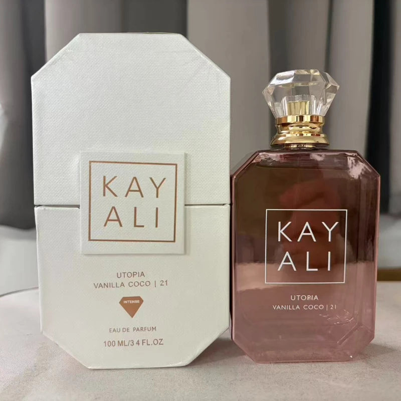 Coffret parfum Kay Ali “Utopia Vanilla Coco 21”, flacons blanc et brun, bouchons dorés