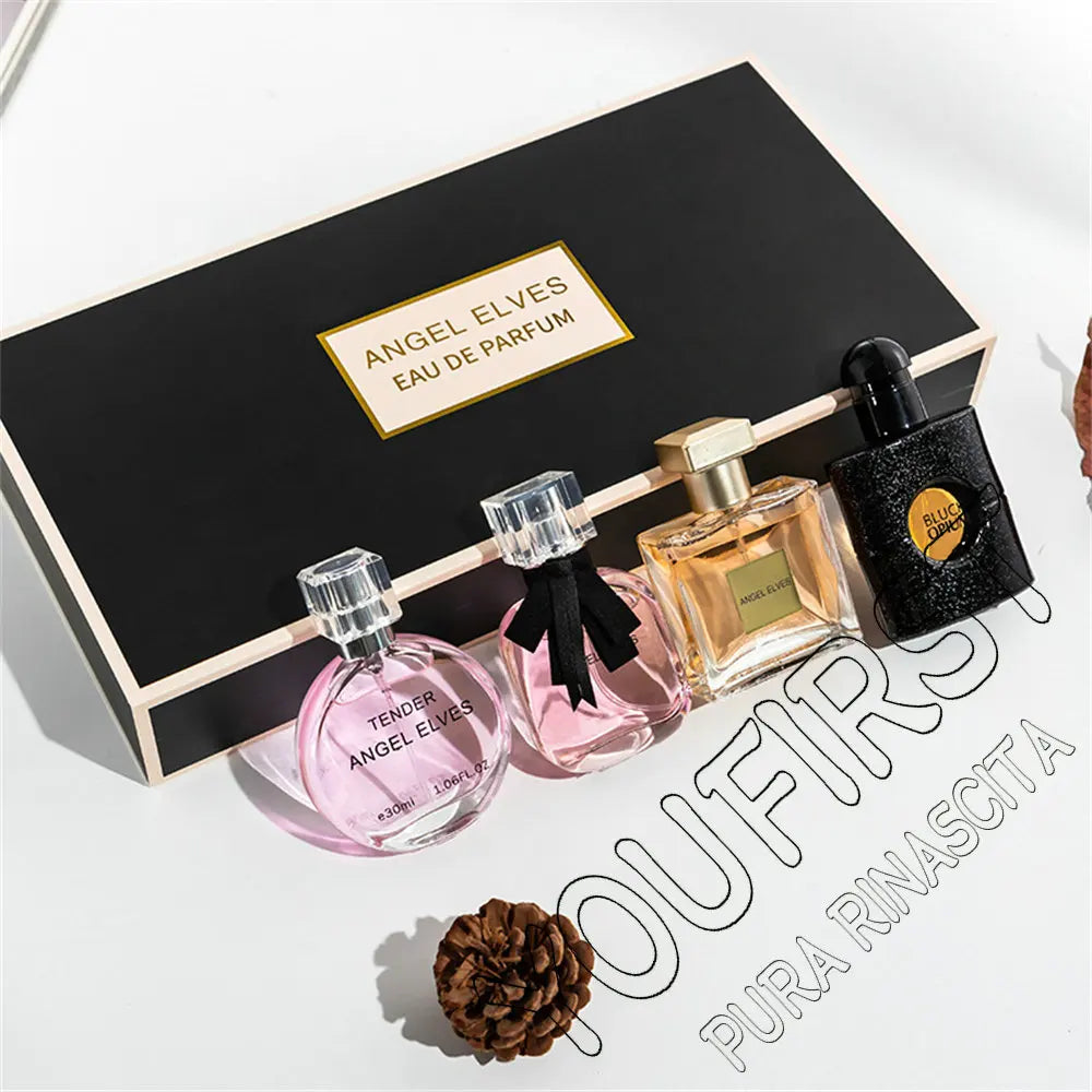 Coffret 4 parfums : flacons décorés de nœuds, plateau noir dans coffret ouvert