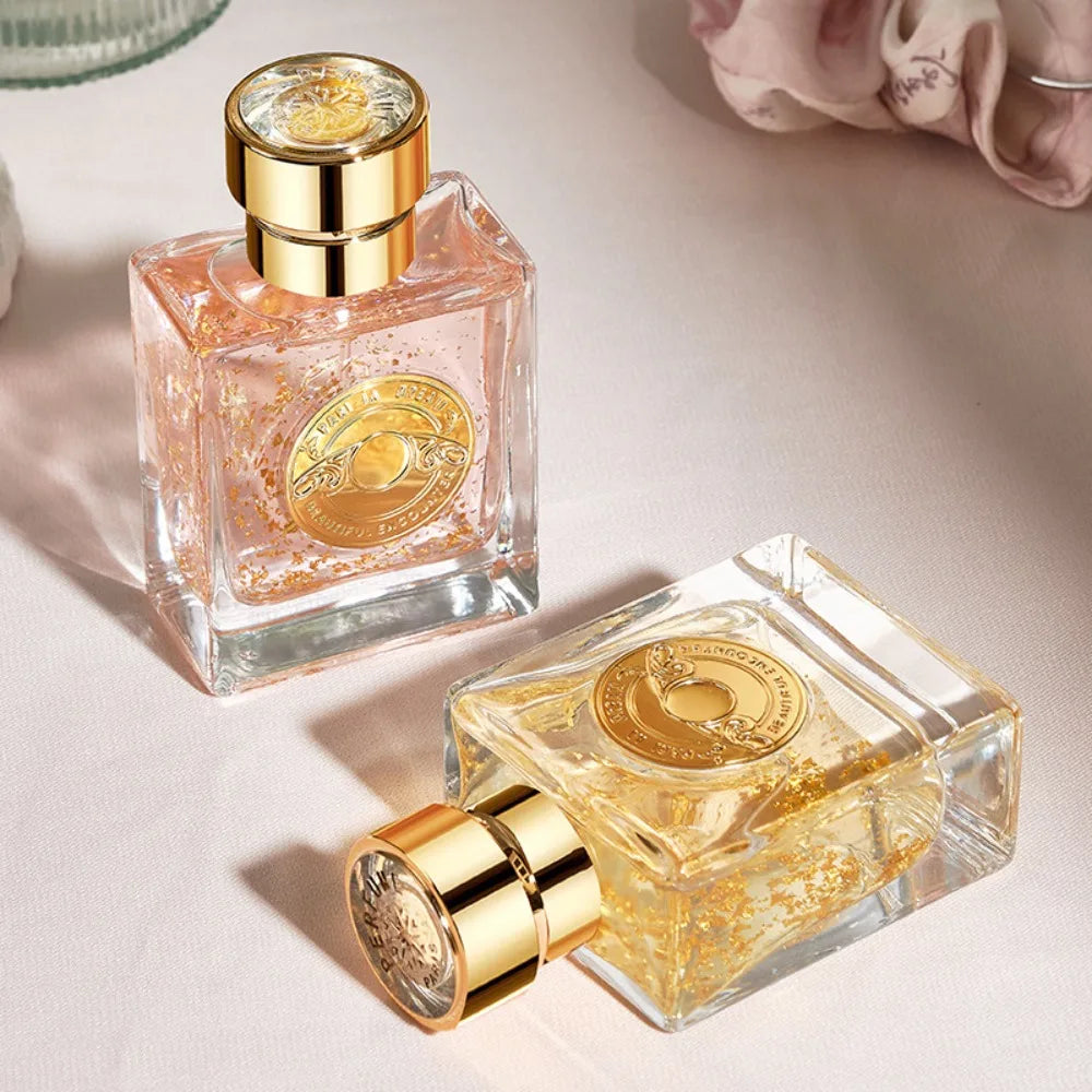 Parfum léger Couleur 01, flacon carré rosé et bouchon doré