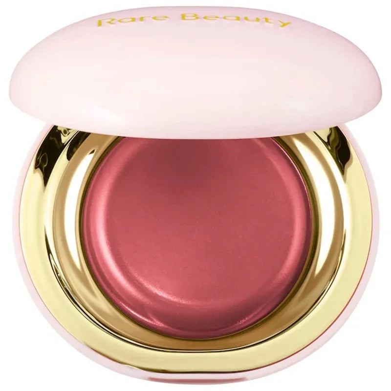 Blush Rare Beauty en pot compact, couvercle ouvert, teinte mauve rosé satinée