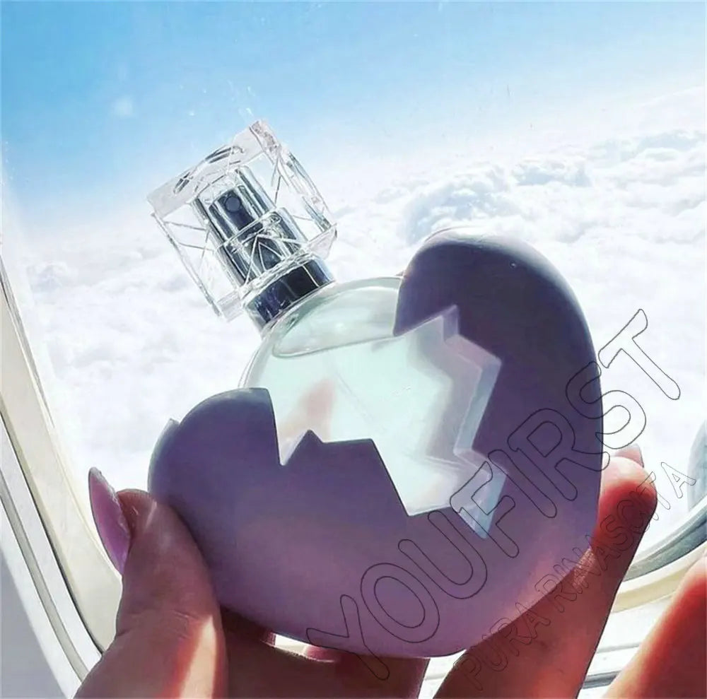 Flacon parfum en cœur violet, bouchon transparent